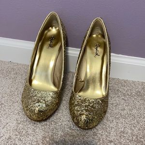Gold sparkly shoes